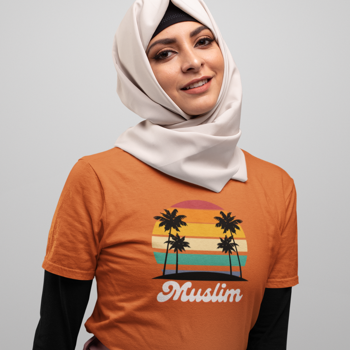 t-shirt-mockup-of-a-woman-wearing-a-hijab-with-a-plain-background-28287 (3)